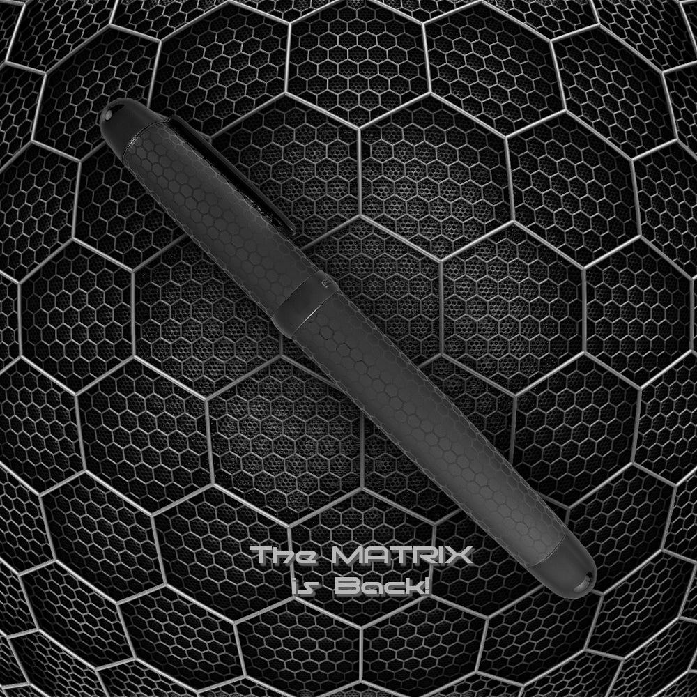 Sherpa Pen Classic Ultra Black Matrix – a sleek, all-black Sharpie and disposable pen cover featuring a dark hexagonal pattern and tactical matte finish for a bold, modern writing accessory.